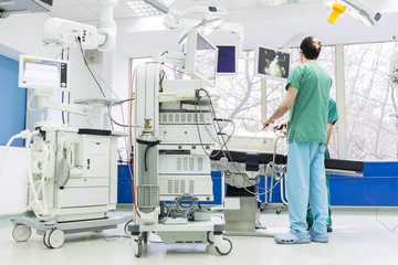 Surgery room doctors working