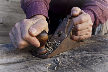 old wooden plane  in hands