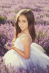 Little girl in a field of lavender