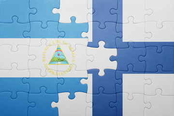 puzzle with the national flag of nicaragua and finland