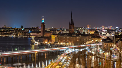 Stockholm at Night. Beautiful nightscape of Stockholm city center, the Venice of the North.  From left to right, Kungsholmen, Stockholm City Hall, Riddarholmen and Gamla Stan are pictured here.