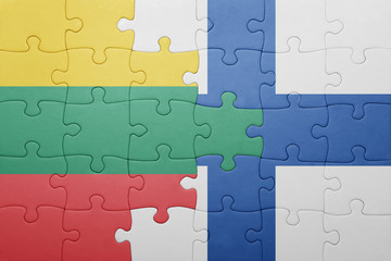Fototapeta premium puzzle with the national flag of lithuania and finland