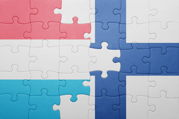 puzzle with the national flag of luxembourg and finland