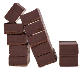 stacks of chocolate pieces isolated on white background