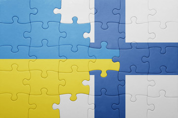puzzle with the national flag of ukraine and finland