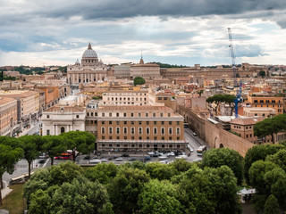 Fototapeta na wymiar A wide shot of The Vatican City and St. Peter’s Basilica (cathedral) with the epic dome. 