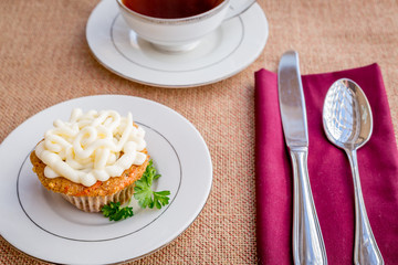 Cream cheese frosted carrot cake cupcakes.