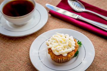 Cream cheese frosted carrot cake cupcakes.