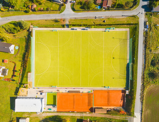 Aerial view of sports area with playgrounds and for soccer, tennis, volleyball and ground hockey in Pilsen suburb, Czech Republic, Europe.
