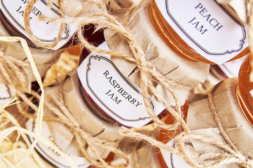 Homemade jams on a wooden shelf