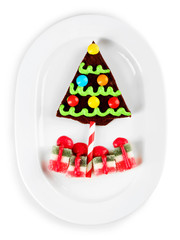 Delicious Christmas cookie and jelly on plate, isolated on white