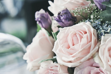 Pink rose in a floral bouquet background
