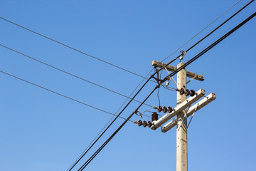 electricity post on a background of the sky.