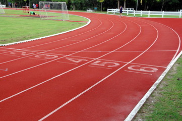 Running track and sports field.