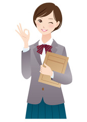 オッケーサインする学生　表情