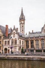 Fototapeta na wymiar Medieval buildings and the clock tower in Ghent, Belgium