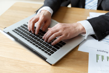 businessman checking financial reports