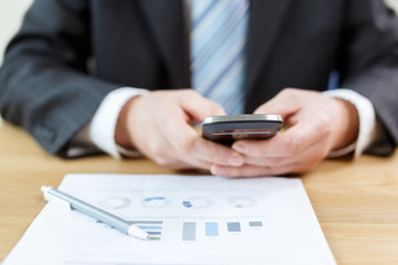 businessman checking financial reports