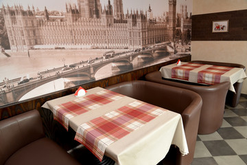 Fragment of an interior of modern cafe in brown tones. Stylizati