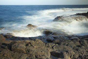 Ocean water rushes into undersea cave openings