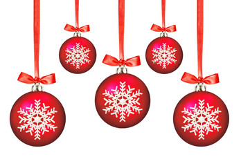Red Christmas balls with bows on white background