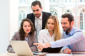Group of business people working together at the office