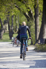 Woman on the bicycle in park