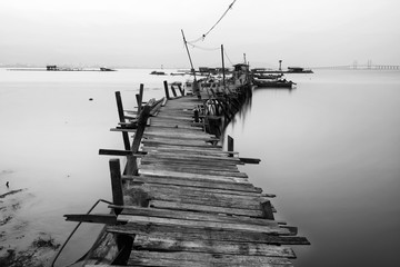 Black and white wooden jetty