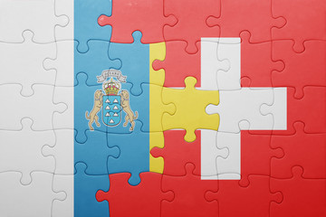 puzzle with the national flag of switzerland and canary islands