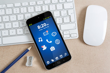 Workplace with modern mobile phone