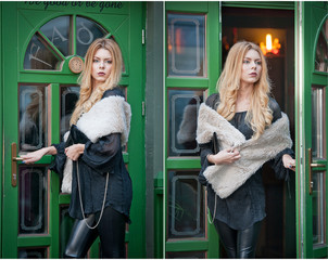 Charming young blonde woman with white fur posing in a green painted door frame. Sexy gorgeous young woman with long curly hair opening the door for somebody. Portrait of sensual woman in black