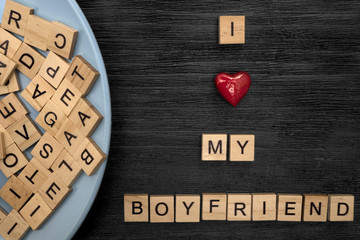Wooden letters spelling I love my boyfriend