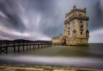 Belem Tower in Lisbon, Portugal in stormy skies