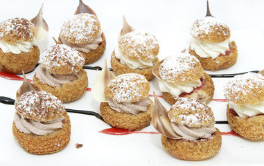 profiteroles with vanilla ice cream decorated with chocolate mint