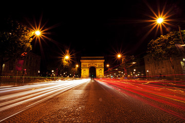 The Arch of Triumph in Paris, France at night