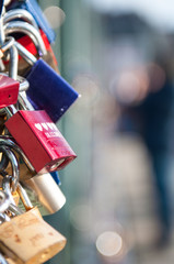 Closed padlocks on a bridge