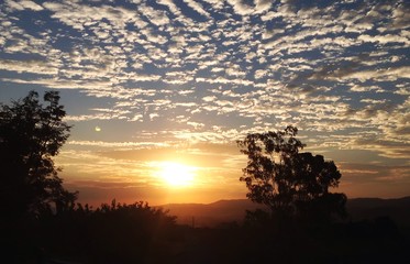 Scattered clouds at sunset