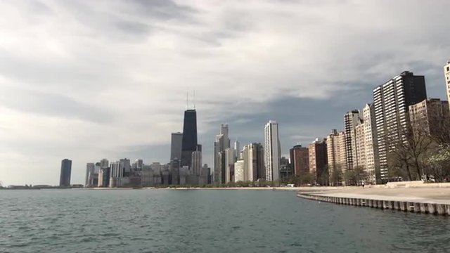 Pan across to the north side of Chicago, Illinois, USA, on Lake Michigan. 4K, Ultra High Definition.