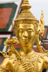Temple or wat in Bangkok Thailand. Kin-naree sculpture is mythological creature, half of bird and girl at Wat-Phra Kaew also called Grand Palace.