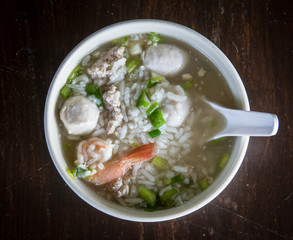 Asian style breakfast soft boiled rice, rice soup Thailand food