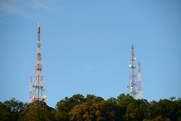 A telecommunications tower on a forest