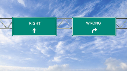Road sign to right and wrong way
