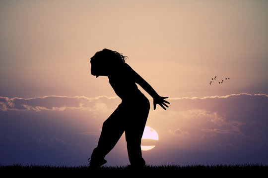 girl dancing hip hop at sunset