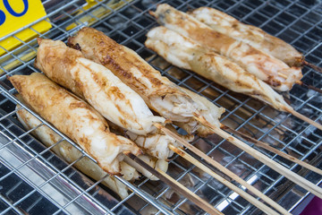 Grilled squid eggs skewers at street food in thailand