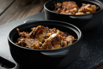 Potatoes baked with sausage and bacon