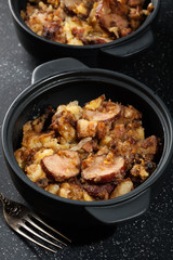 Potatoes baked with sausage and bacon