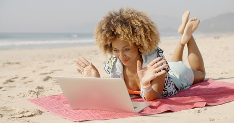 Woman Using Her Laptop Outdoor