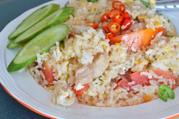 fried rice with pork and red chili on dish