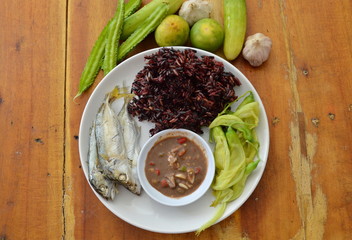 black sticky rice eat with steam mackerel and shrimp paste sauce