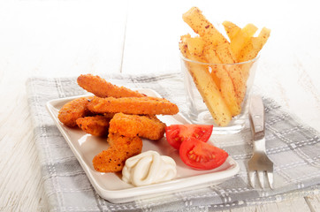 breaded chicken nuggets with mayonnaise and tomato